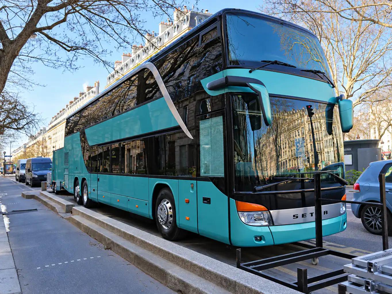 BusCom double-decker coach on a Paris boulevard