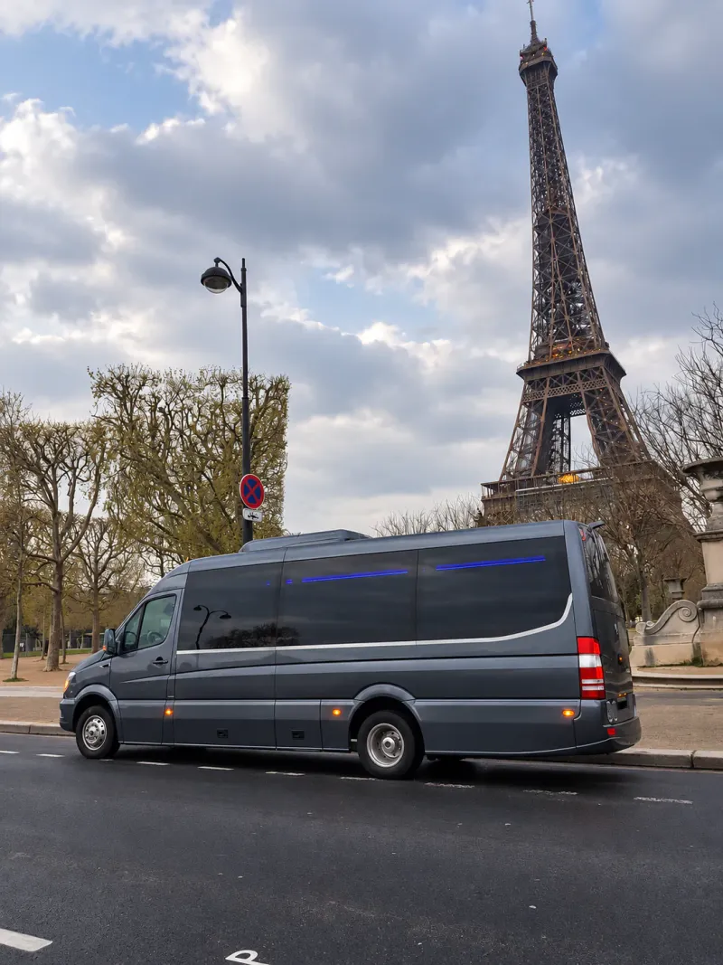 BusCom Mercedes Sprinter minibus in front of the Eiffel Tower in Paris